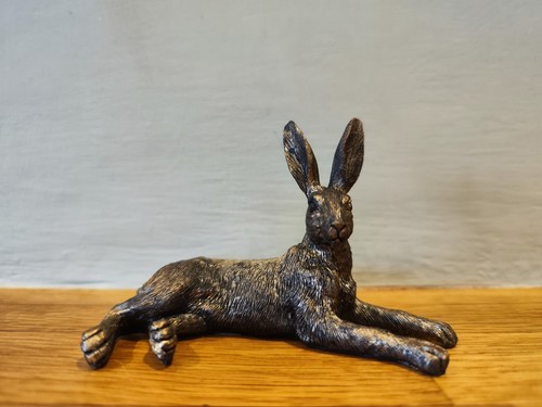 Bronze effect lying hare - effect,